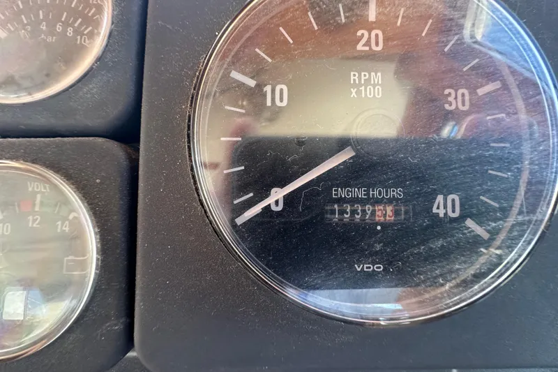 Slide: The Image of Close-up of Eagle 40 Pilothouse Trawler 2000 engine RPM gauge showing 1339.5 hours. - 42