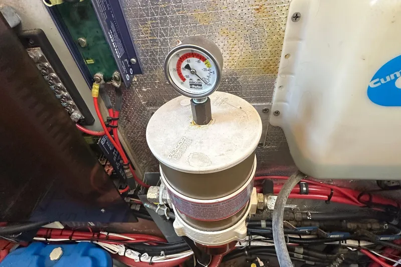 Slide: The Image of Engine room of 2000 Eagle 40 Pilothouse Trawler with fuel filter and gauge. - 60