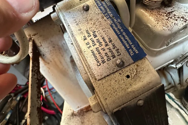 Slide: The Image of Close-up of a 2000 Eagle 40 Pilothouse Trawler engine label with text details. - 61