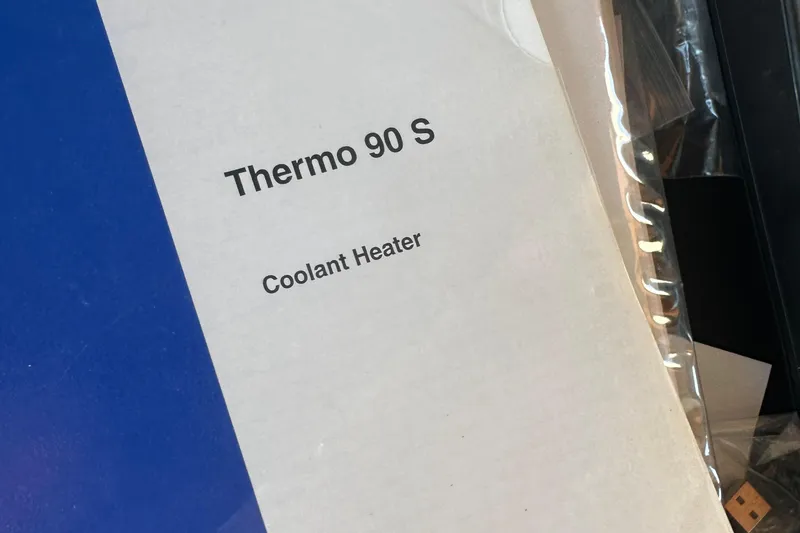 Slide: The Image of Box labeled "Thermo 90 S Coolant Heater" for Eagle 40 Pilothouse Trawler 2000. - 69