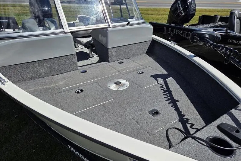 Slide: The Image of 2018 Tracker PG V16 WT fishing boat with spacious deck and windshield. - 10