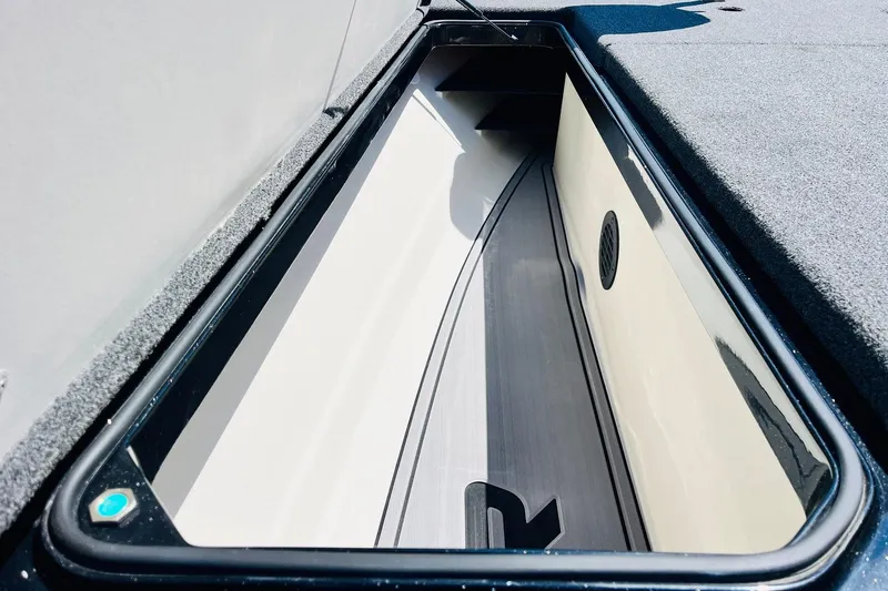 Slide: The Image of 2024 Ranger Z521R Ranger Cup Equipped boat storage compartment, open and empty. - 17