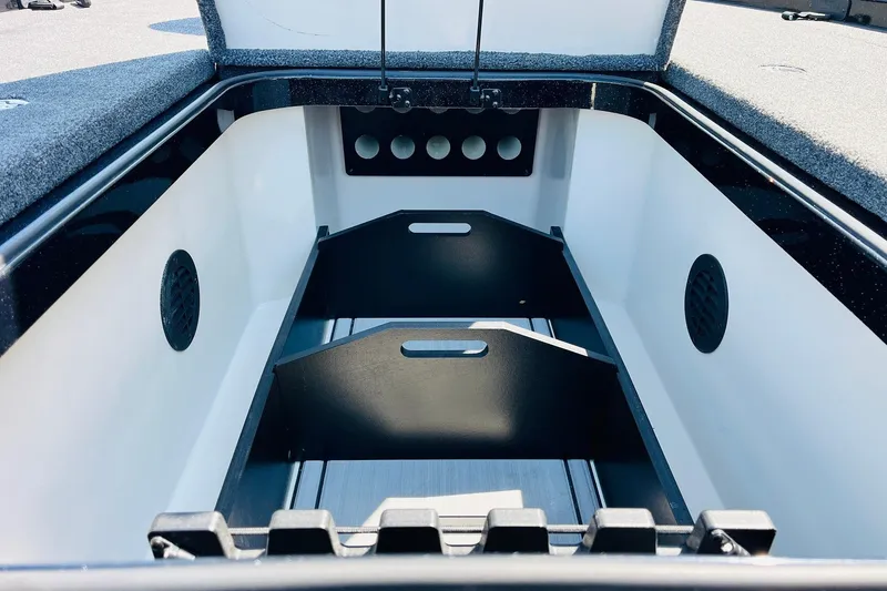 Slide: The Image of 2024 Ranger Z521R Ranger Cup Equipped boat storage compartment, featuring organized interior design. - 19