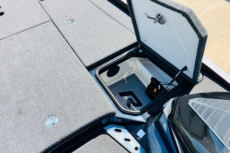 Slide: The Image of 2024 Ranger Z521R Ranger Cup Equipped boat storage compartment open. - 23