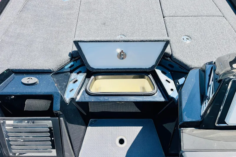 Slide: The Image of 2024 Ranger Z521R Ranger Cup Equipped boat with open storage compartment. - 26