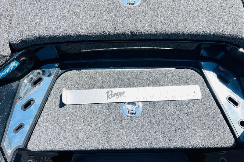 Slide: The Image of 2024 Ranger Z521R Ranger Cup Equipped boat deck with measuring ruler. - 29