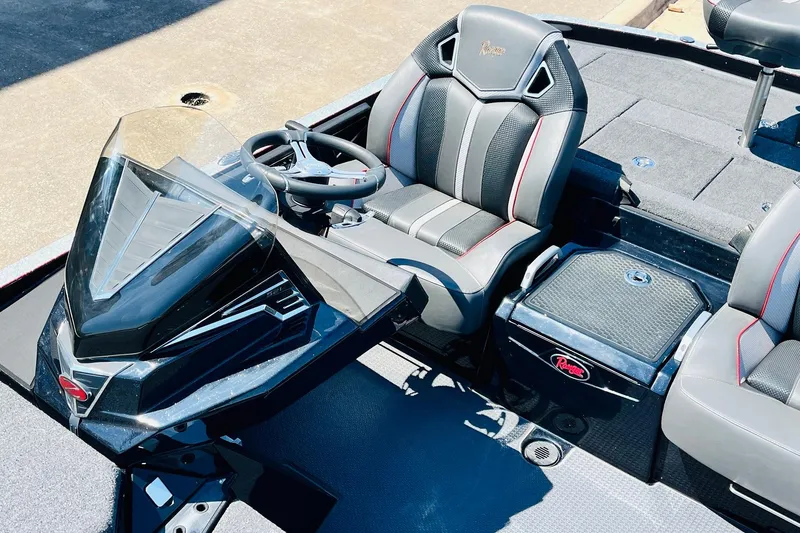 Slide: The Image of 2024 Ranger Z521R Ranger Cup Equipped boat interior with steering wheel and seating. - 32