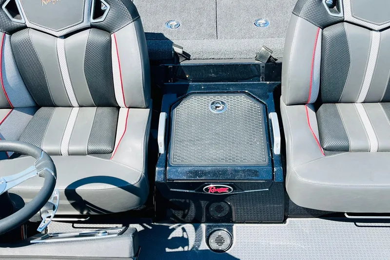 Slide: The Image of 2024 Ranger Z521R Ranger Cup boat interior with gray and red seats, steering wheel, and console. - 33