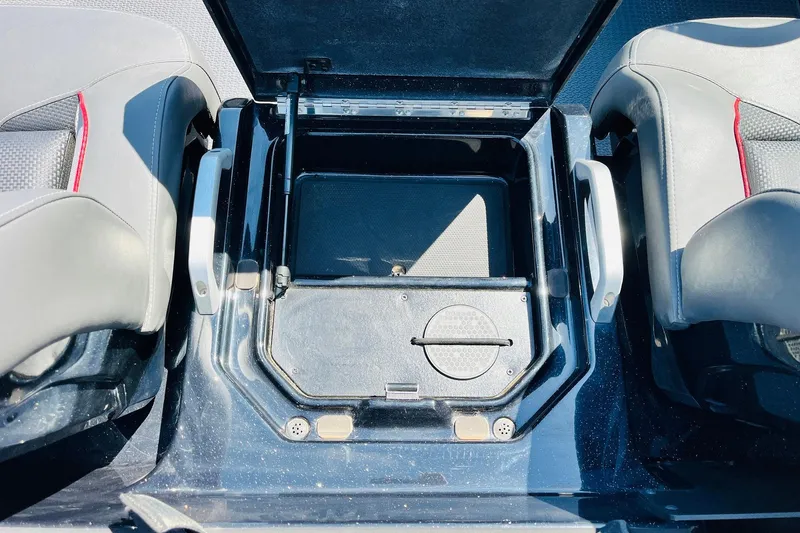 Slide: The Image of 2024 Ranger Z521R Ranger Cup Equipped boat storage compartment between seats. - 34