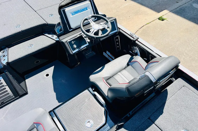 Slide: The Image of 2024 Ranger Z521R Ranger Cup Equipped boat interior with steering wheel and seating. - 36