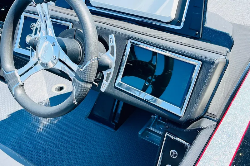 Slide: The Image of 2024 Ranger Z521R Ranger Cup dashboard with steering wheel and digital display. - 38