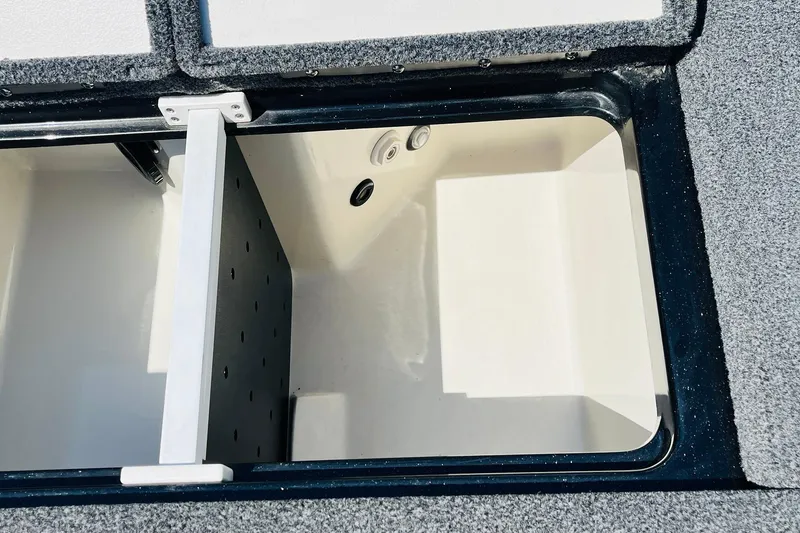 Slide: The Image of 2024 Ranger Z521R Ranger Cup Equipped boat storage compartment, open and empty. - 44