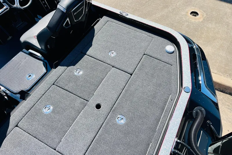 Slide: The Image of 2024 Ranger Z521R Ranger Cup Equipped boat interior with carpeted storage compartments. - 49