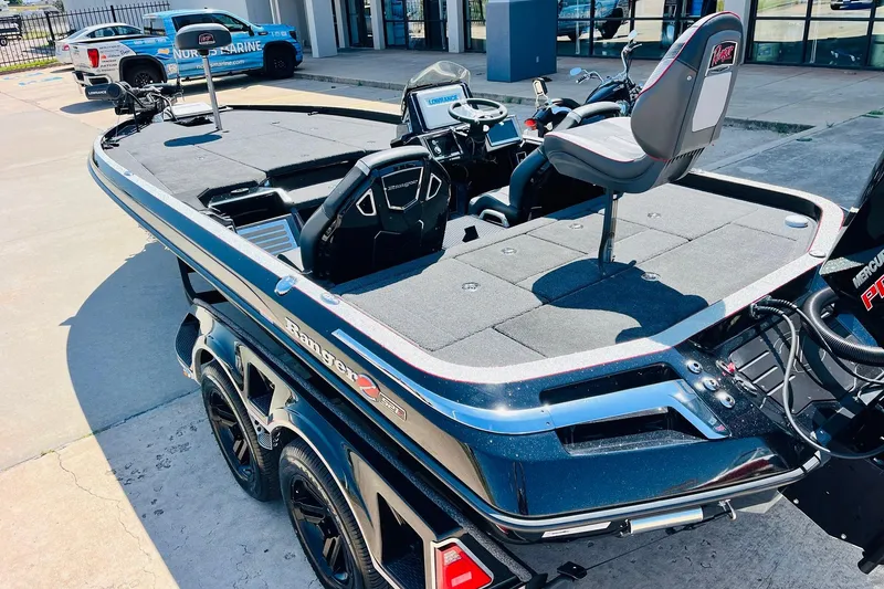 Slide: The Image of 2024 Ranger Z521R Ranger Cup Equipped boat, sleek design, parked outdoors. - 6