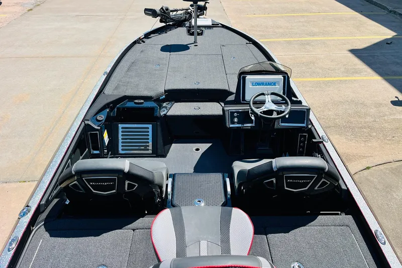 Slide: The Image of 2024 Ranger Z521R Ranger Cup Equipped boat interior with steering console and seating. - 9