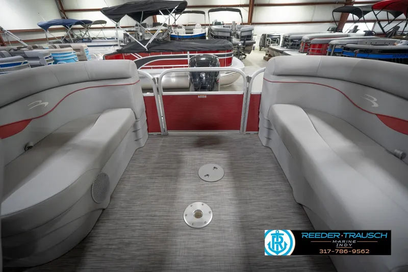 Slide: The Image of Interior of a 2021 Bennington 20 SVSR pontoon boat with gray seating. - 18