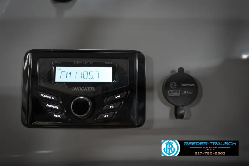 Slide: The Image of Kicker media center and audio input on 2021 Bennington 20 SVSR boat dashboard. - 32