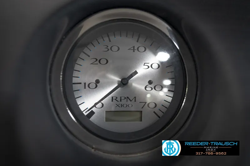 Slide: The Image of Close-up of a tachometer on a 2021 Bennington 20 SVSR boat dashboard. - 35