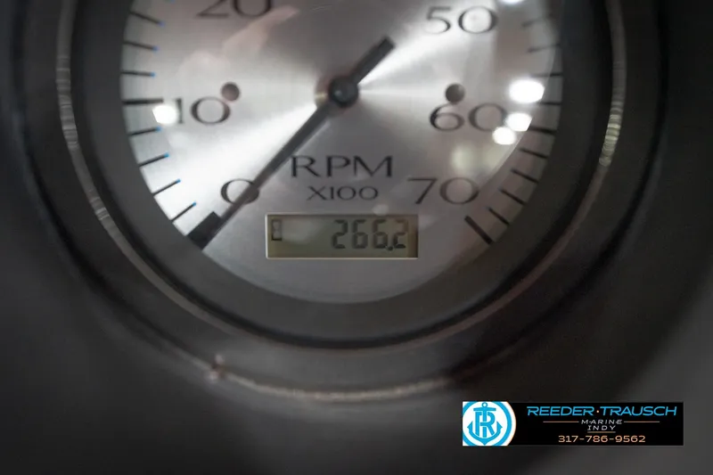 Slide: The Image of Close-up of a 2021 Bennington 20 SVSR RPM gauge displaying 266.2 hours. - 36