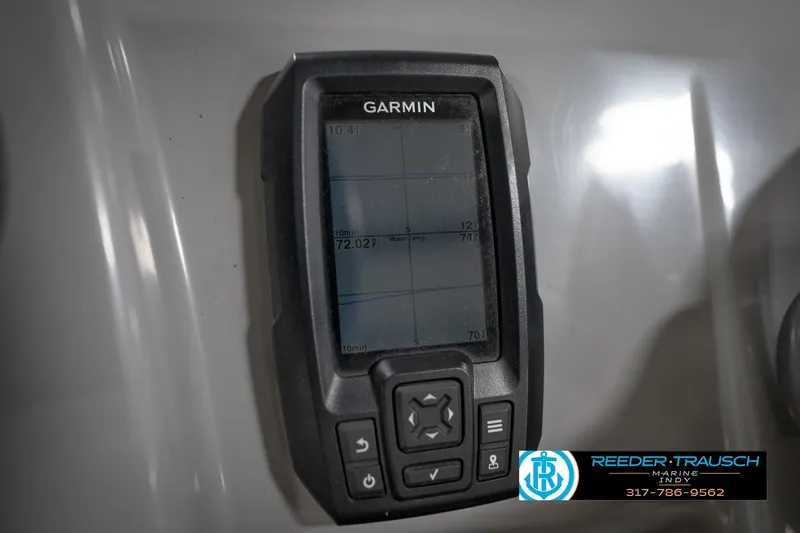 Slide: The Image of Garmin device on 2021 Bennington 20 SVSR boat dashboard, displaying navigation data. - 39