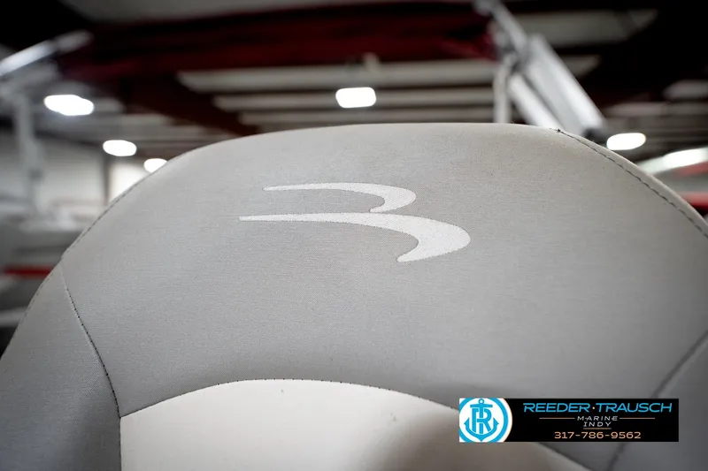 Slide: The Image of Close-up of 2021 Bennington 20 SVSR boat seat with logo in showroom. - 42