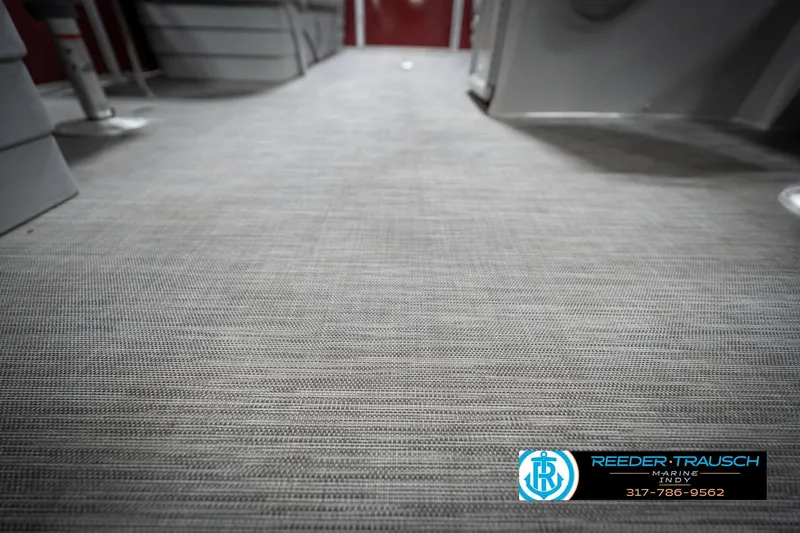 Slide: The Image of 2021 Bennington 20 SVSR boat interior flooring with Reeder-Trausch Marine logo. - 47