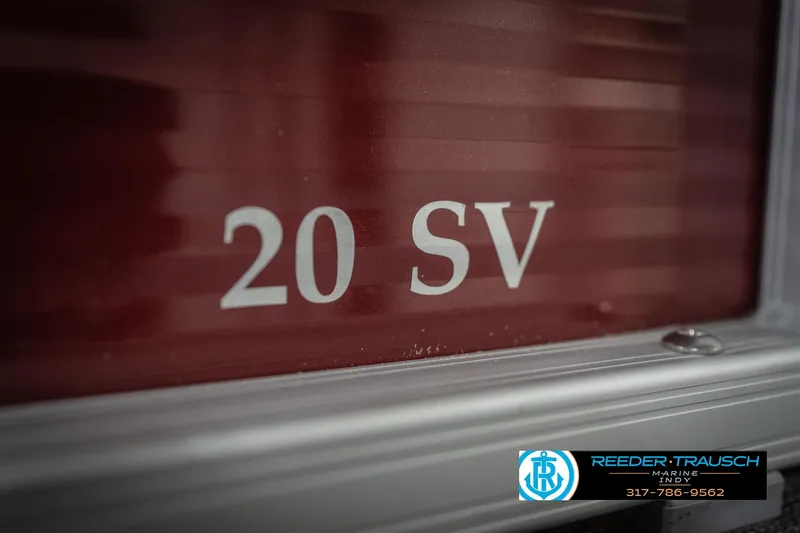 Slide: The Image of Close-up of 2021 Bennington 20 SVSR boat model number on red background. - 49