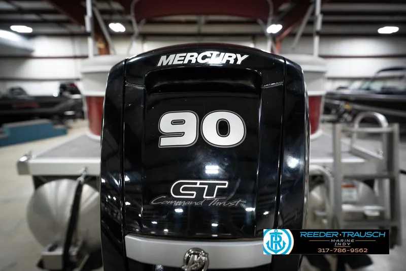 Slide: The Image of Mercury 90 Command Thrust engine on 2021 Bennington 20 SVSR boat in showroom. - 52