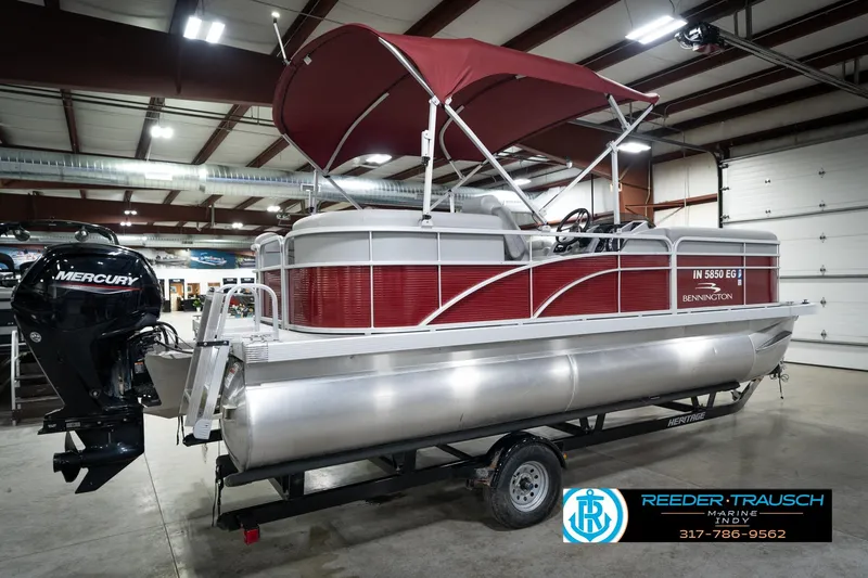Slide: The Image of 2021 Bennington 20 SVSR pontoon boat with red canopy and Mercury outboard motor. - 8