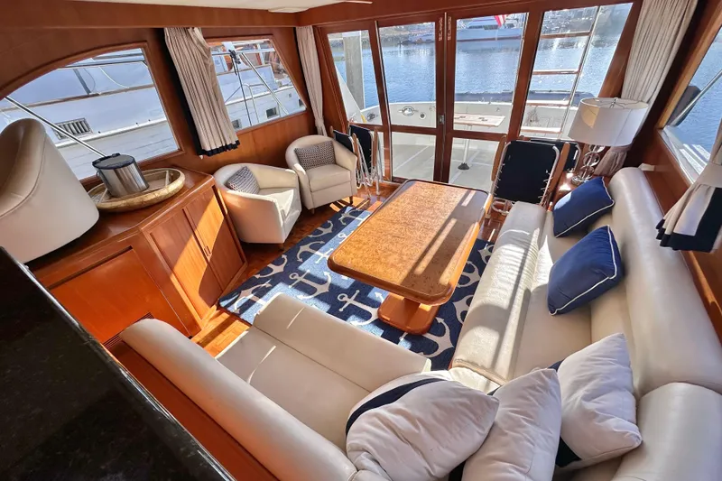 Slide: The Image of Luxurious interior of 2003 Ocean Alexander 42 Sport Sedan with elegant seating and nautical decor. - 10