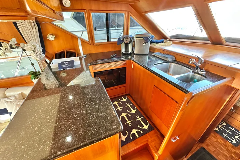 Slide: The Image of Luxurious kitchen interior of 2003 Ocean Alexander 42 Sport Sedan yacht. - 16