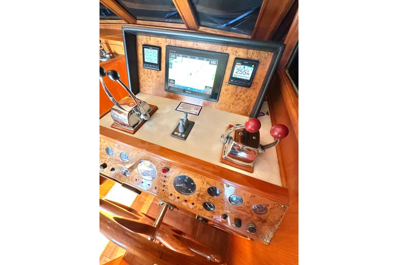 Slide: The Image of Control panel of a 2003 Ocean Alexander 42 Sport Sedan yacht with navigation instruments. - 19