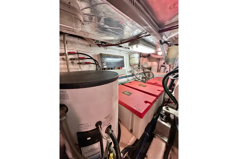 Slide: The Image of Engine room of 2003 Ocean Alexander 42 Sport Sedan with equipment and wiring. - 36