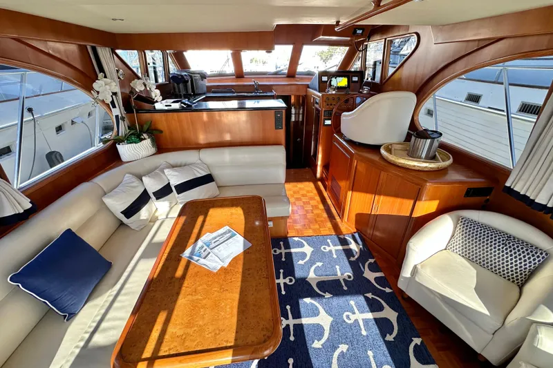 Slide: The Image of Luxurious interior of 2003 Ocean Alexander 42 Sport Sedan yacht with elegant seating and decor. - 8