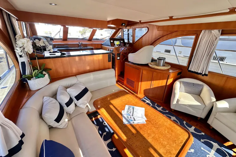 Slide: The Image of Luxurious interior of 2003 Ocean Alexander 42 Sport Sedan yacht with elegant seating and decor. - 9