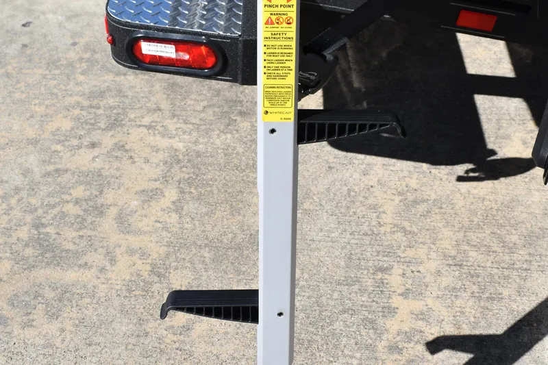 Slide: The Image of Lowrance equipment on 2025 Triton 20XP Patriot boat, showcasing advanced navigation technology. - 12