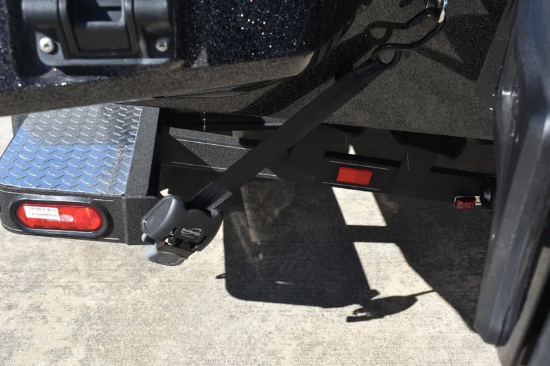 Slide: The Image of Triton 20XP Patriot 2025 boat with Lowrance electronics and trolling motor setup. - 13