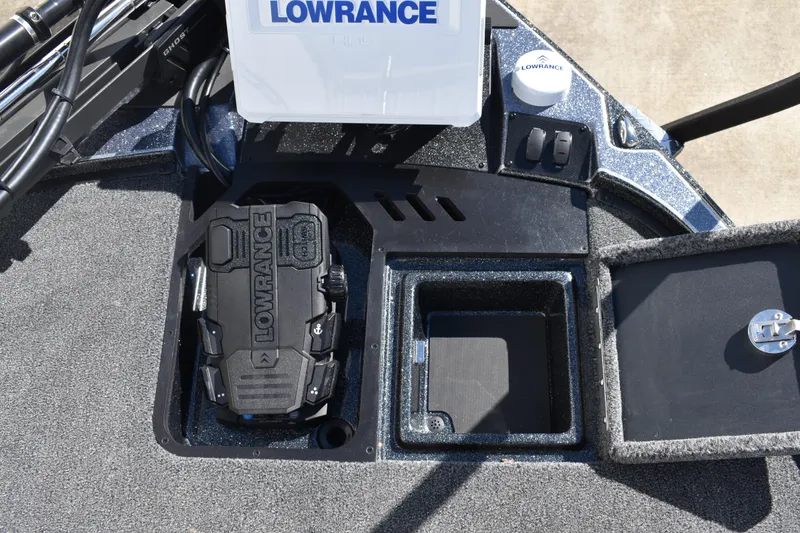 Slide: The Image of 2025 Triton 20XP Patriot boat deck with storage compartments and sleek design. - 17