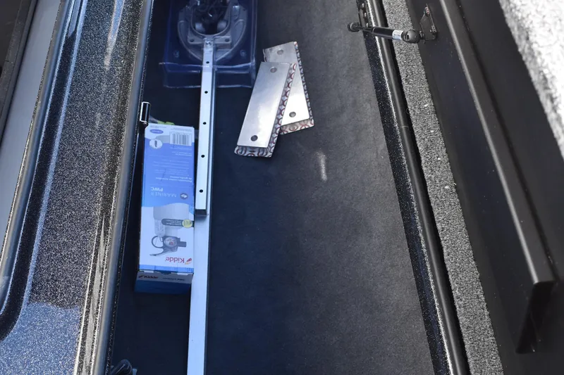 Slide: The Image of Steering console of 2025 Triton 20XP Patriot boat with Lowrance display. - 23