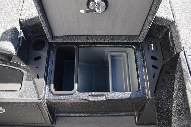 Slide: The Image of Close-up of 2025 Triton 20XP Patriot boat controls and steering wheel. - 28