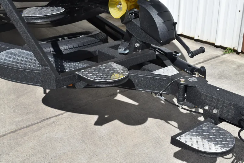 Slide: The Image of Triton 20XP Patriot 2025 trailer tire with alloy wheel on diamond plate surface. - 3