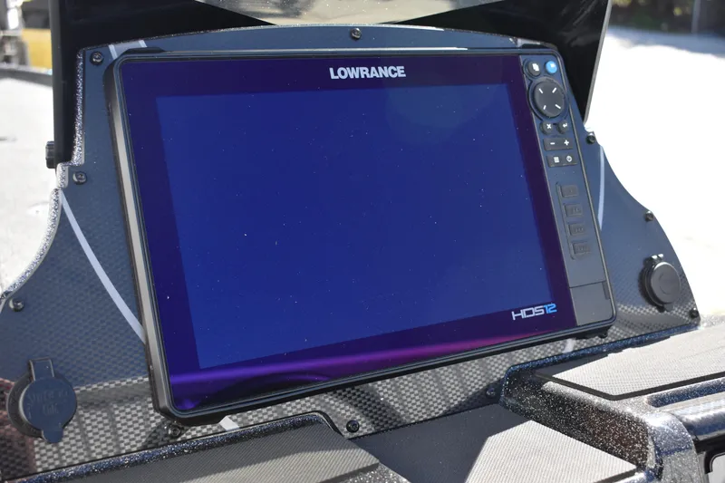 Slide: The Image of Control panel of 2025 Triton 20XP Patriot boat with labeled switches. - 30