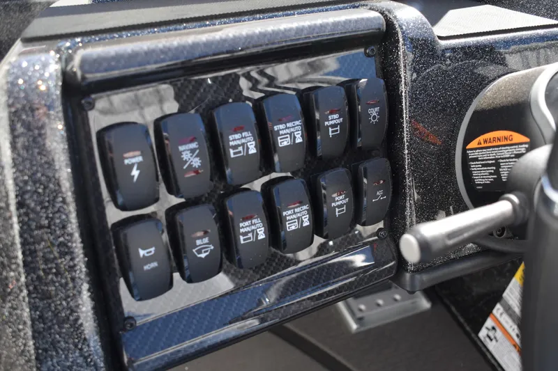 Slide: The Image of Foot pedal in 2025 Triton 20XP Patriot boat cockpit, showcasing control mechanism. - 31