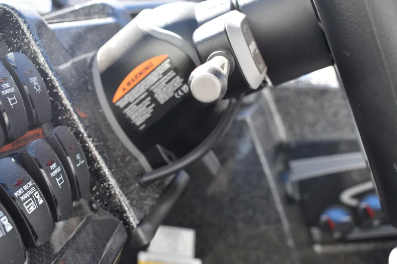 Slide: The Image of Storage compartments on a 2025 Triton 20XP Patriot boat deck. - 32