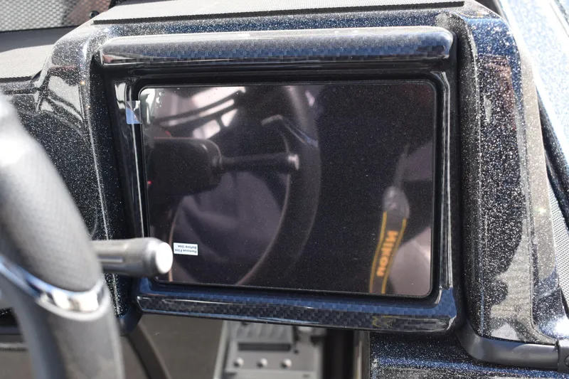 Slide: The Image of 2025 Triton 20XP Patriot boat engine compartment with Seastar hydraulic steering system. - 33