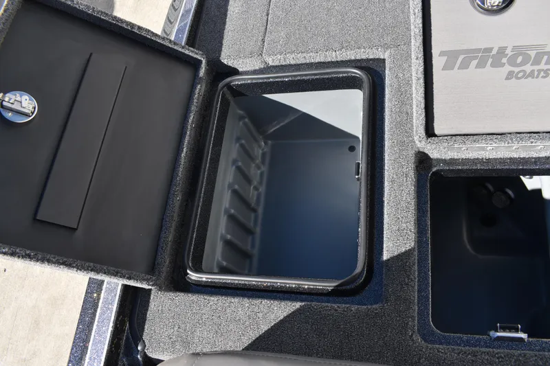 Slide: The Image of Close-up of Triton 20XP Patriot 2025 boat hull with drainage and fittings. - 39