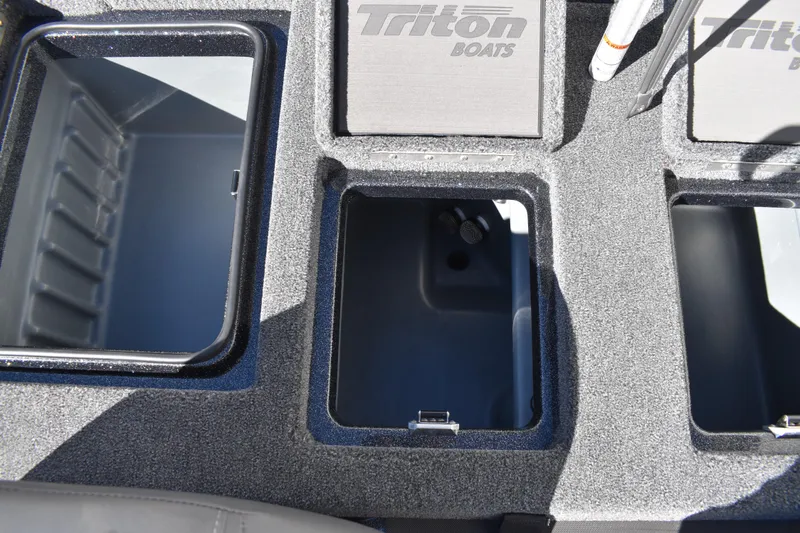 Slide: The Image of 2025 Triton 20XP Patriot boat cleat on textured deck surface. - 40