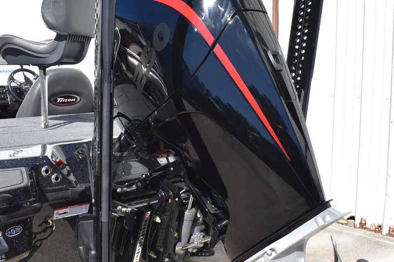 Slide: The Image of 2025 Triton 20XP Patriot trailer hitch with safety strap and diamond plate step. - 8