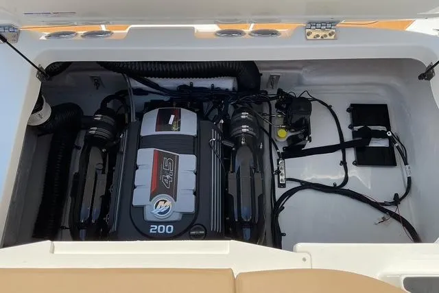 Slide: The Image of 2025 Bayliner V20i engine compartment with 4.5L 200 horsepower engine. - 19