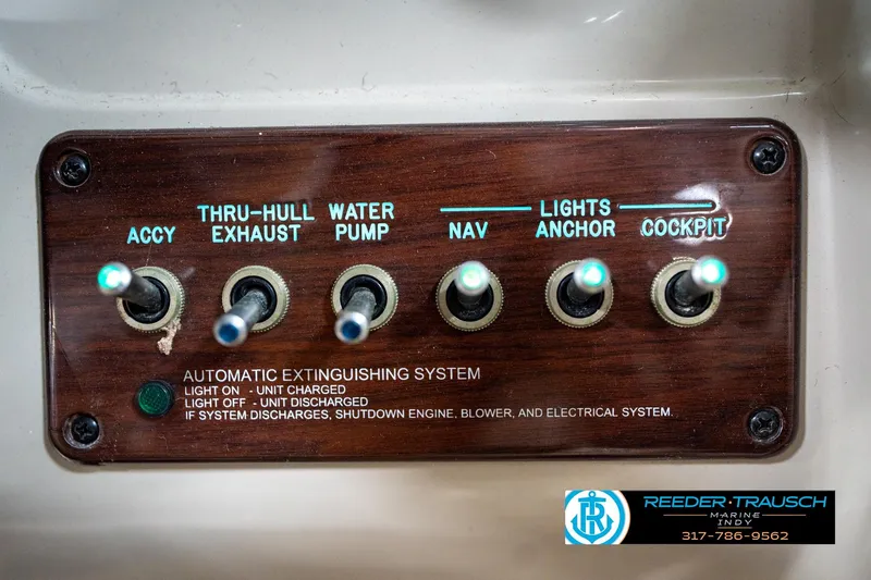 Slide: The Image of Close-up of 2005 Sea Ray 200 Sundeck dashboard gauge with Reeder Trausch Marine logo. - 33